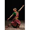 Young beautiful woman dancer exponent of Indian classical dance Bharatanatyam