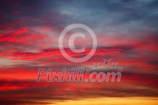 Sunset clouds in the sky - bright and colorful Sunset clouds in the sky - bright and colorful