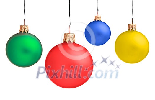 Several hanging Christmas baubles isolated on white background