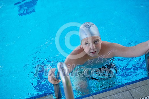 child on swimming pool learning to swim w child on swimming pool learning to swim w