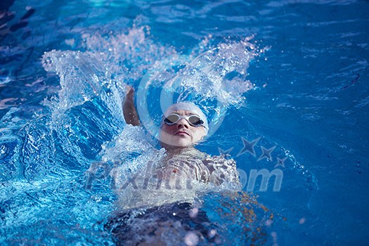 swimmer excercise on indoor swimming pool, sport and health concept swimmer excercise on indoor swimming pool, sport and health concept