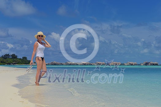 happy young woman on summer vacation on beautiful tropical beach have fun and relax happy young woman on summer vacation on beautiful tropical beach have fun and relax