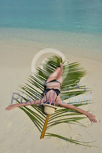 happy young woman on summer vacation on beautiful tropical beach have fun enjoy and relax happy young woman on summer vacation on beautiful tropical beach have fun enjoy and relax