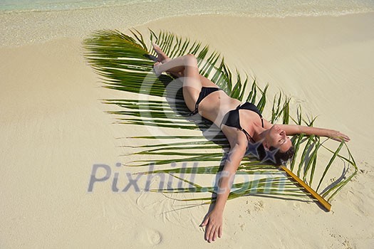 happy young woman on summer vacation on beautiful tropical beach have fun enjoy and relax