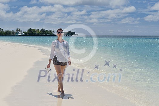 happy young woman on summer vacation on beautiful tropical beach have fun enjoy and relax happy young woman on summer vacation on beautiful tropical beach have fun enjoy and relax