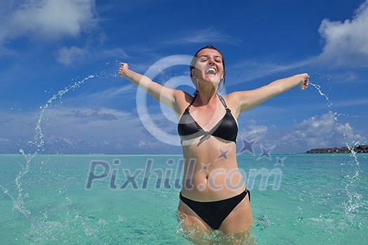 happy young woman on summer vacation on beautiful tropical beach have fun enjoy and relax happy young woman on summer vacation on beautiful tropical beach have fun enjoy and relax