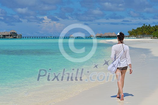 happy young woman on summer vacation on beautiful tropical beach have fun and relax happy young woman on summer vacation on beautiful tropical beach have fun and relax