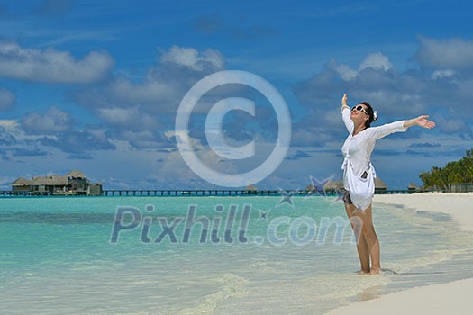happy young woman on summer vacation on beautiful tropical beach have fun enjoy and relax happy young woman on summer vacation on beautiful tropical beach have fun enjoy and relax
