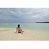 happy young woman on summer vacation on beautiful tropical beach have fun enjoy and relax