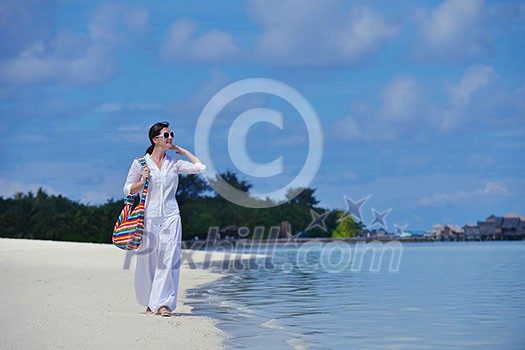 happy young woman on summer vacation on beautiful tropical beach have fun enjoy and relax happy young woman on summer vacation on beautiful tropical beach have fun enjoy and relax