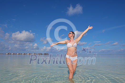 happy young woman on summer vacation on beautiful tropical beach have fun enjoy and relax happy young woman on summer vacation on beautiful tropical beach have fun enjoy and relax