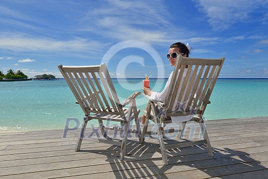 happy young couple relax and take fresh drink at summer vacation happy young couple relax and take fresh drink at summer vacation