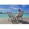 happy young couple relax and take fresh drink at summer vacation