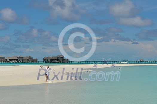 happy young woman on summer vacation on beautiful tropical beach have fun enjoy and relax