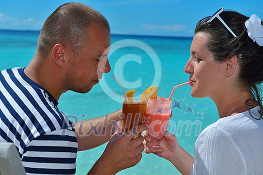 happy young couple relax and take fresh drink at summer vacation happy young couple relax and take fresh drink at summer vacation