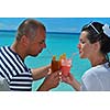 happy young couple relax and take fresh drink at summer vacation