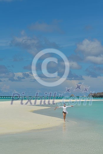happy young woman on summer vacation on beautiful tropical beach have fun enjoy and relax happy young woman on summer vacation on beautiful tropical beach have fun enjoy and relax