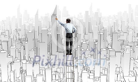 Rear view of businessman standing on ladder and drawing project