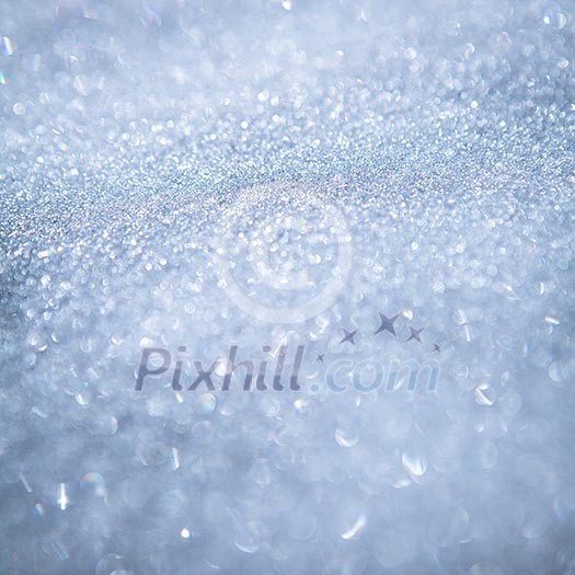 Snowy background - texture of white snow sparkling in the sun Snowy background - texture of white snow sparkling in the sun