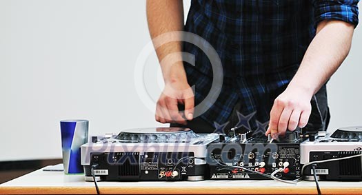dj equipment gramophone and mixete with dj hand on party event dj equipment gramophone and mixete with dj hand on party event