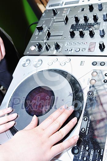 dj equipment gramophone and mixete with dj hand on party event dj equipment gramophone and mixete with dj hand on party event