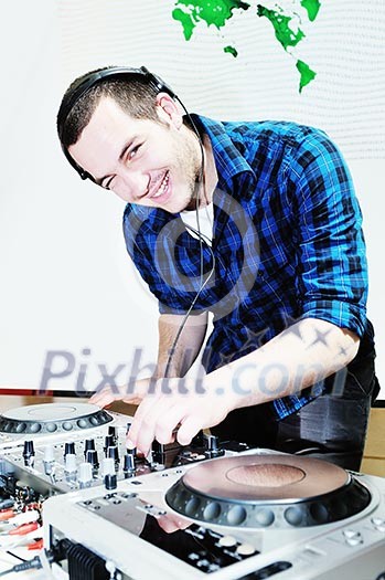 young dj man with headphones and compact disc dj equipment on party young dj man with headphones and compact disc dj equipment on party