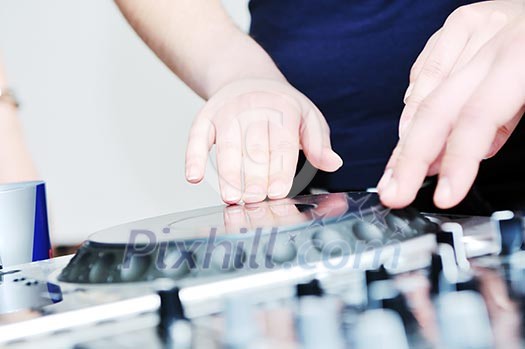 dj equipment gramophone and mixete with dj hand on party event dj equipment gramophone and mixete with dj hand on party event