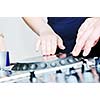 dj equipment gramophone and mixete with dj hand on party event