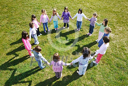 happy child kids group have fun and play at kindergarden outdoor preschool education concept with  teacher