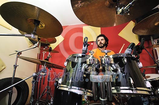 drums music player at home garage on training and practice drums music player at home garage on training and practice