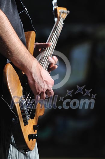 young music player playing guitar instrument young music player playing guitar instrument