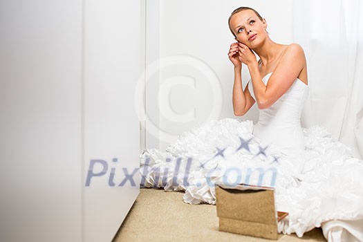 Beautiful bride getting ready for her wedding day