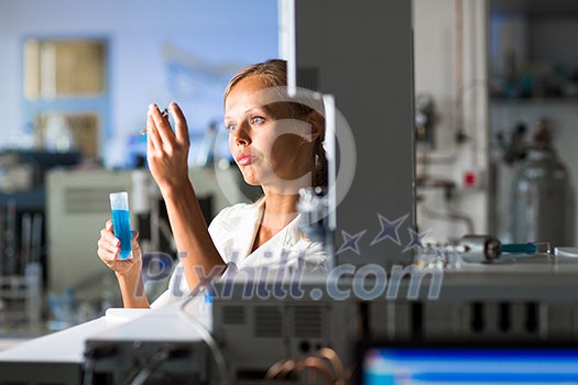 Portrait of a female researcher doing research in a lab (shallow DOF; color toned image) Portrait of a female researcher doing research in a lab (shallow DOF; color toned image)