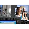 Portrait of a female researcher doing research in a lab (shallow DOF; color toned image)