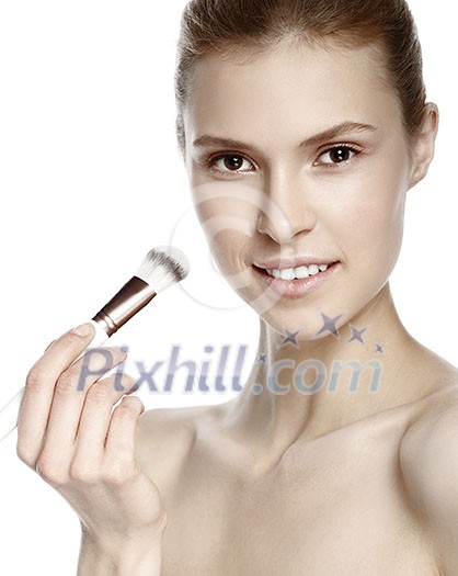 Beauty portrait of young, attractive, fresh, healthy and natural woman with makeup brush. Isolated on white. Beauty portrait of young, attractive, fresh, healthy and natural woman with makeup brush. Isolated on white.