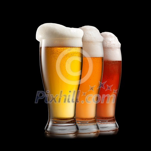 Different beer in glasses isolated on white background