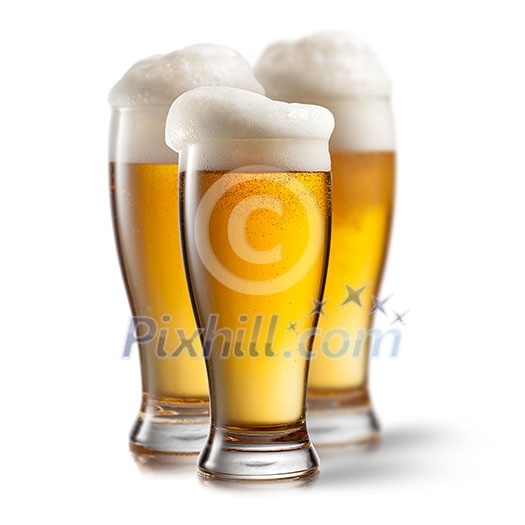 Beer in glasses isolated on white background Beer in glasses isolated on white background