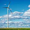 Wind generator turbine on summer landscape