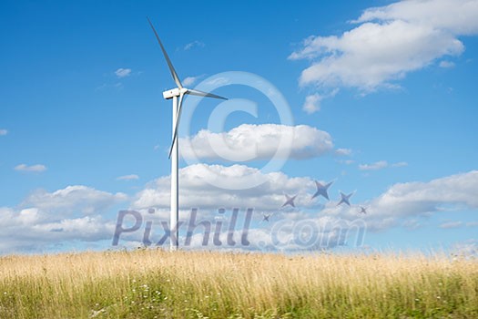 Wind generator turbine on summer landscape