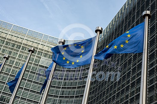 European Union flags in front of the Berlaymont building (European commission) in Brussels, Belgium.