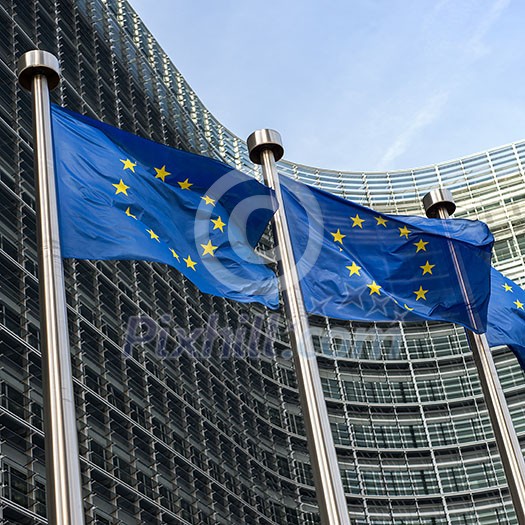 European Union flags in front of the Berlaymont building (European commission) in Brussels, Belgium.