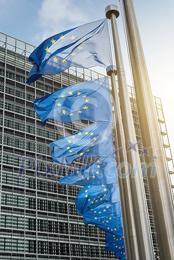 European Union flags in front of the Berlaymont building (European commission) in Brussels, Belgium.