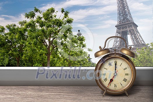 View of Paris and Eiffel tower from window with alarm clock View of Paris and Eiffel tower from window with alarm clock