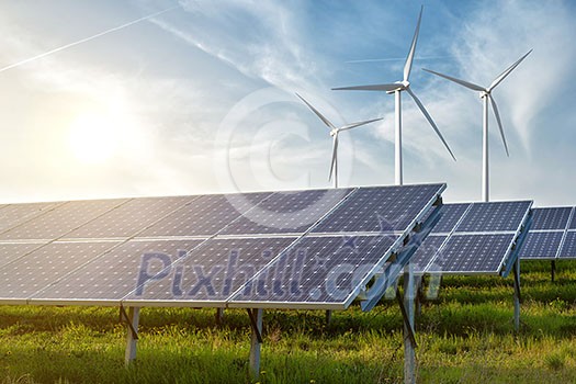 solar panels and wind generators under blue sky on sunset solar panels and wind generators under blue sky on sunset
