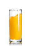 orange juice in the glass isolated on white