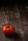 Tomato on a wooden table