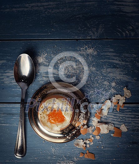 Boiled egg for breakfast on wooden table. Toned like instagram. Boiled egg for breakfast on wooden table. Toned like instagram.