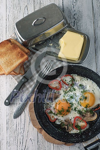 Fried egg for breakfast in the countryside