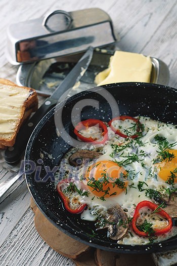 Fried egg for breakfast in the countryside