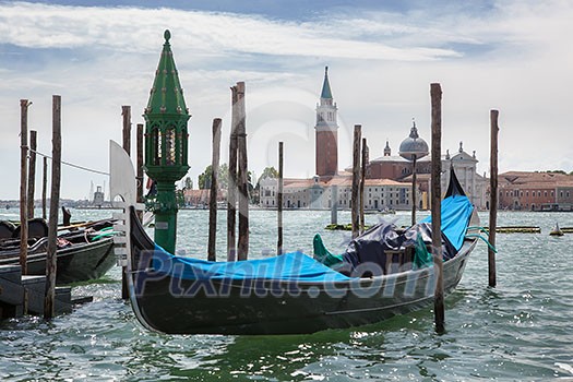 Gondolas and San Giorgio Maggiore church on Grand Canal in Venice